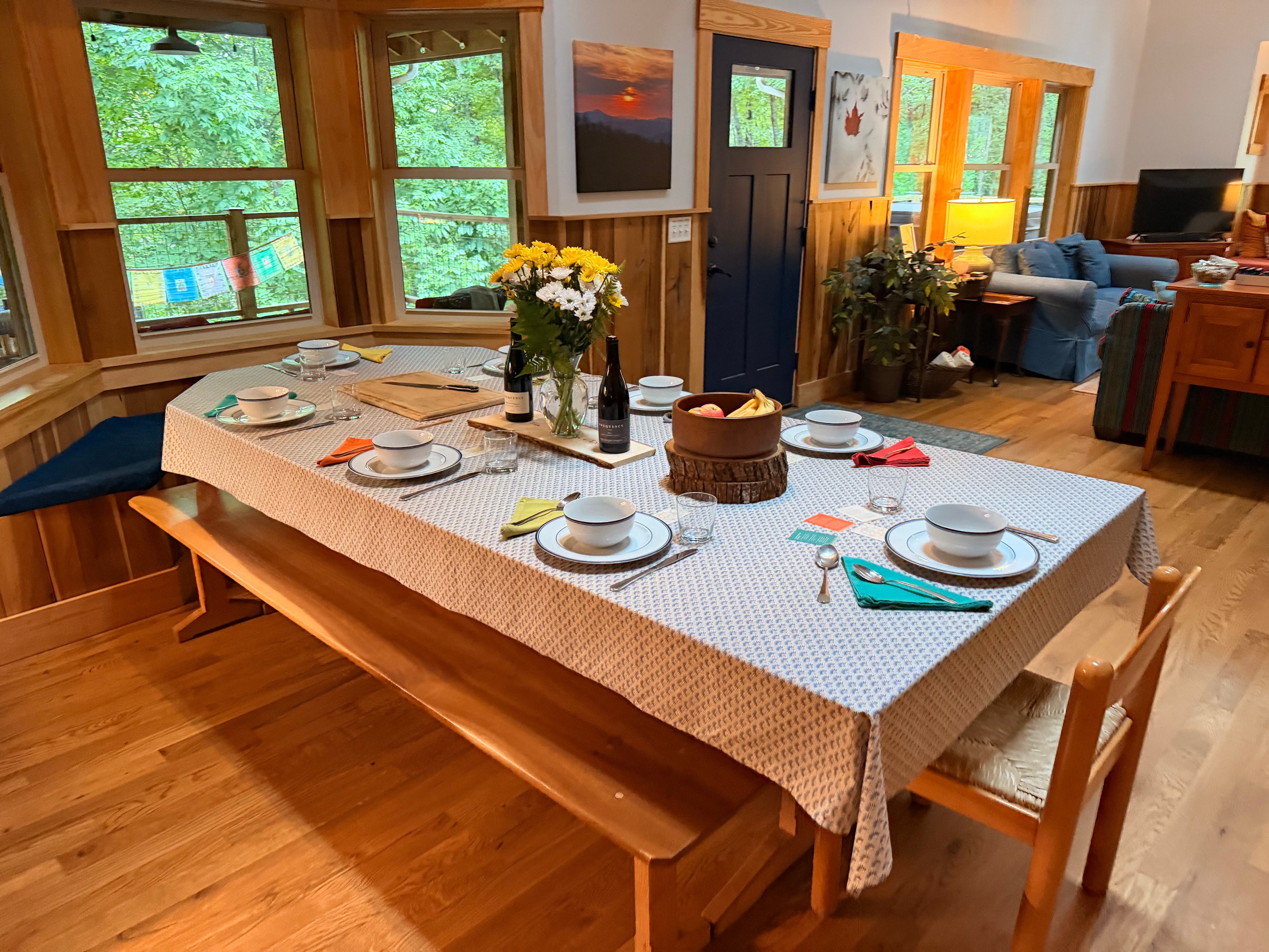 Warm cabin dining room set for a shared meal
